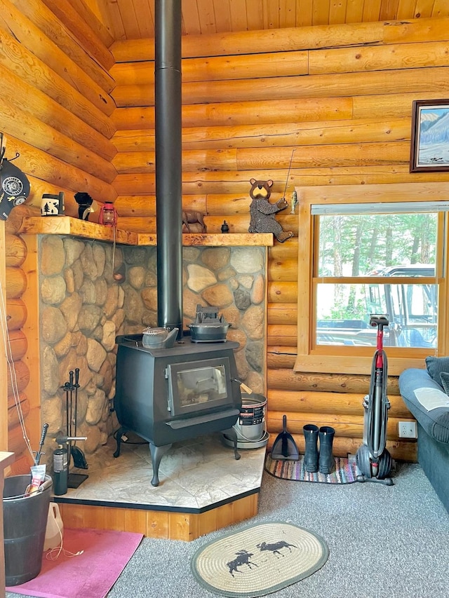 30 Williams Gulch Loop, Philipsburg, MT 59858 - detailed view of a wood stove, log walls, and wooden ceiling