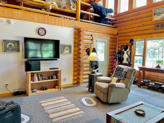 30 Williams Gulch Loop, Philipsburg, MT 59858 - carpeted living room featuring log walls and a high ceiling