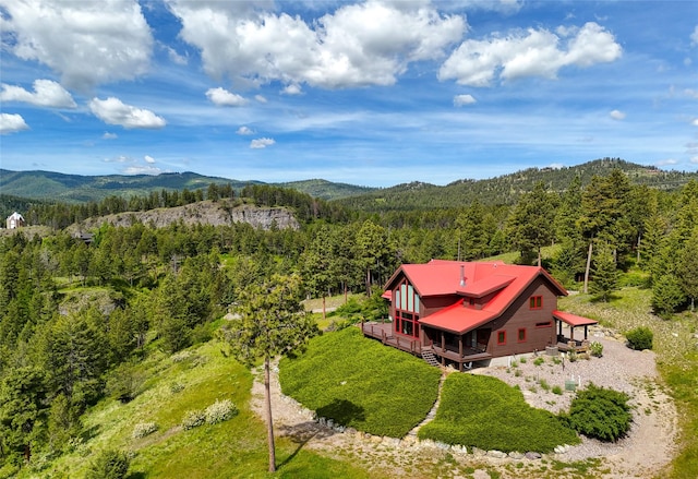 251 S Eighty Dr, Somers, MT 59932 - aerial view of property and surrounding area featuring a forest and mountains
