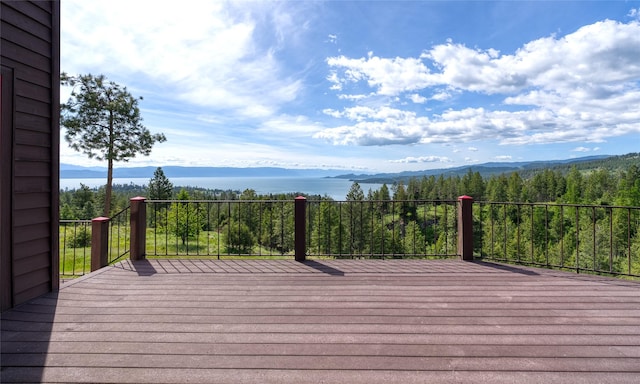 251 S Eighty Dr, Somers, MT 59932 - wooden deck with a mountain view