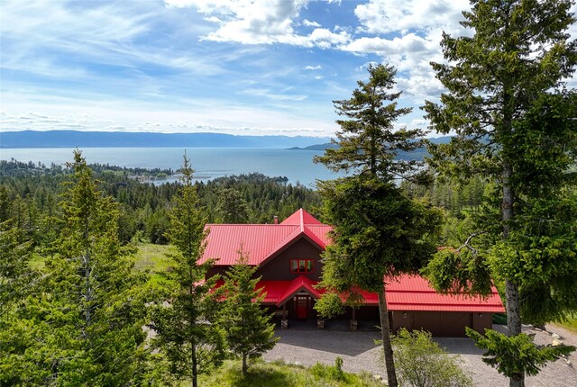 251 S Eighty Dr, Somers, MT 59932 - water view with a heavily wooded area and mountains