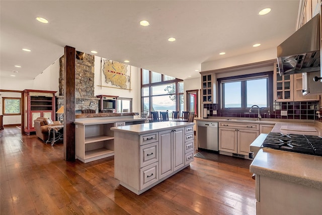 251 S Eighty Dr, Somers, MT 59932 - kitchen with range hood, dishwasher, open shelves, a kitchen island, and glass insert cabinets