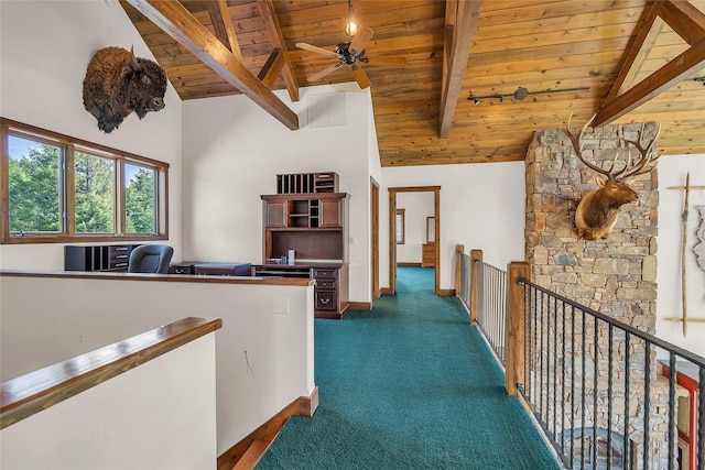 251 S Eighty Dr, Somers, MT 59932 - corridor with a wooden ceiling with exposed beams, an upstairs landing, high vaulted ceiling, and carpet flooring