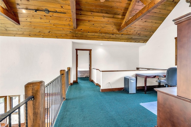 251 S Eighty Dr, Somers, MT 59932 - hall with wood ceiling, carpet floors, baseboards, track lighting, and an upstairs landing