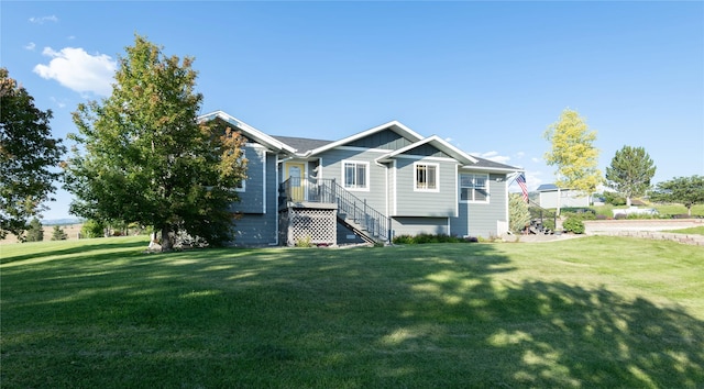 5946 Johnson Rd, East Helena, MT 59635 - back of property with a lawn and board and batten siding