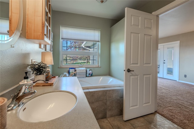 5946 Johnson Rd, East Helena, MT 59635 - full bath featuring a sink, a bath, and tile patterned floors