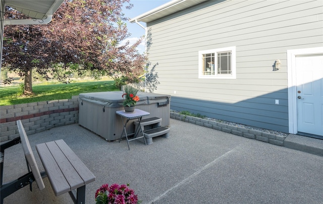 5946 Johnson Rd, East Helena, MT 59635 - view of patio featuring a hot tub