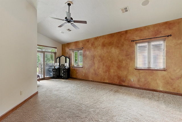 1112 Anglers Bend Way, Missoula, MT 59802 - carpeted spare room with baseboards, lofted ceiling, and a ceiling fan