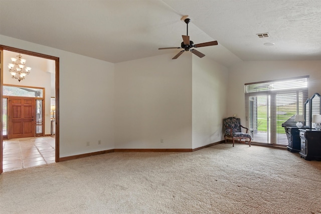 1112 Anglers Bend Way, Missoula, MT 59802 - empty room with carpet floors, vaulted ceiling, a chandelier, a ceiling fan, and baseboards