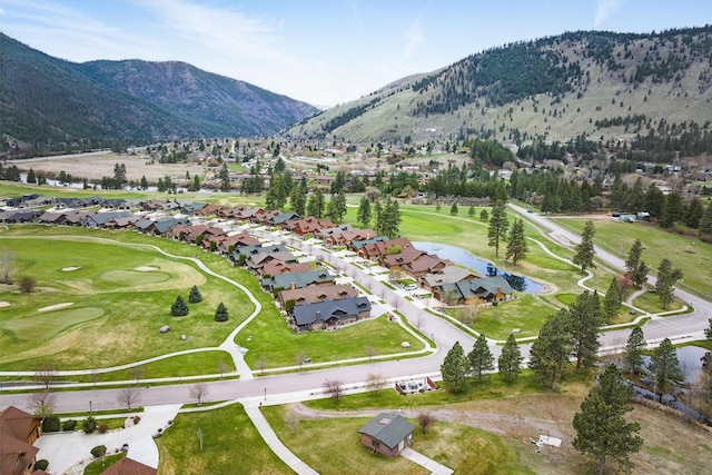 1112 Anglers Bend Way, Missoula, MT 59802 - aerial overview of property's location with a local golf course, a water and mountain view, and nearby suburban area