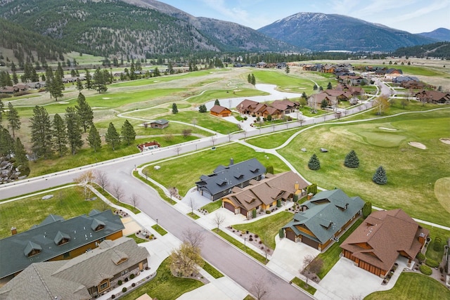 1112 Anglers Bend Way, Missoula, MT 59802 - aerial perspective of suburban area featuring a golf course and a mountainous background