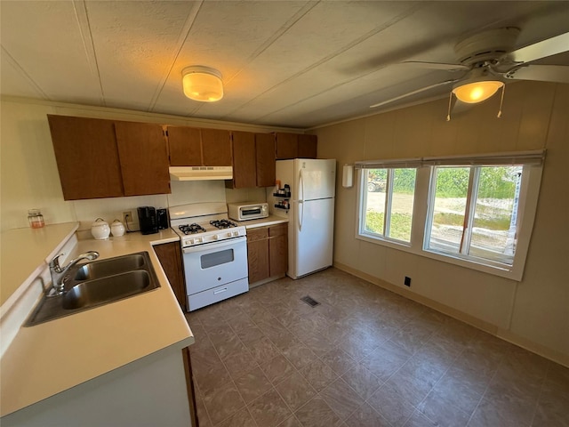 991 Phillips Rd, Helena, MT 59602 - kitchen featuring white appliances, under cabinet range hood, a sink, ceiling fan, and light countertops