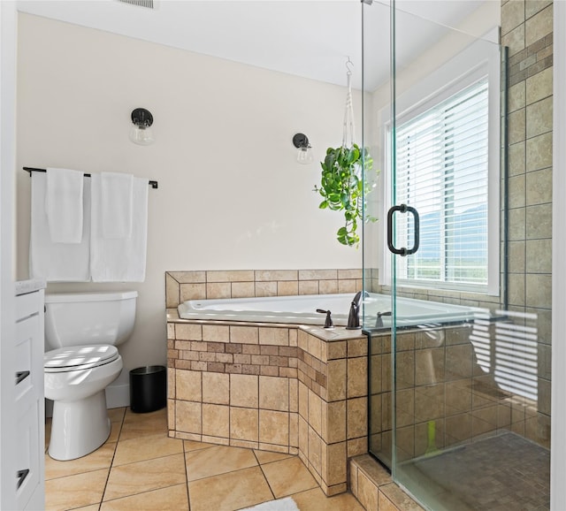 1683 Foxtail Dr, Kalispell, MT 59901 - full bathroom featuring a garden tub, tile patterned flooring, and a stall shower
