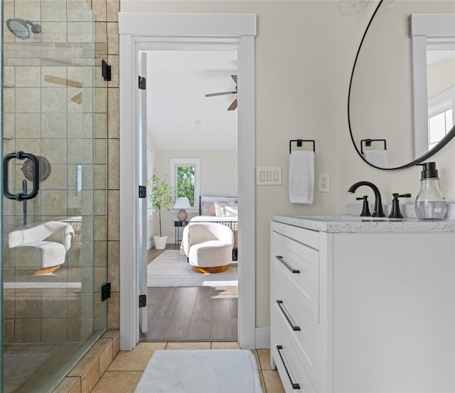1683 Foxtail Dr, Kalispell, MT 59901 - ensuite bathroom with vanity, a stall shower, and a ceiling fan