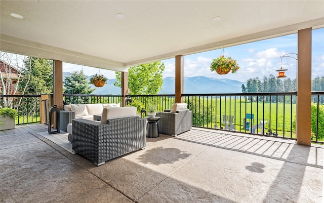 1683 Foxtail Dr, Kalispell, MT 59901 - view of patio with an outdoor hangout area and a mountain view
