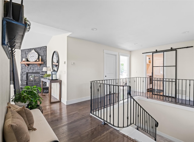 1683 Foxtail Dr, Kalispell, MT 59901 - hall with an upstairs landing, wood finished floors, and recessed lighting