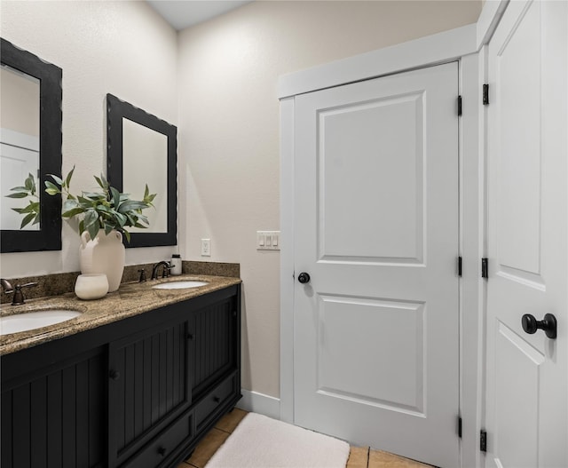 1683 Foxtail Dr, Kalispell, MT 59901 - full bathroom featuring double vanity and tile patterned flooring