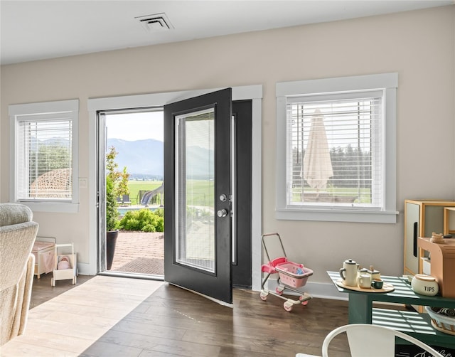 1683 Foxtail Dr, Kalispell, MT 59901 - doorway featuring plenty of natural light and wood finished floors