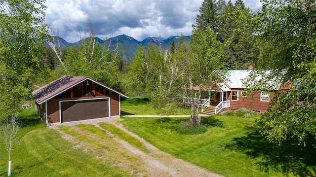 221 Kauffman Ln, Kalispell, MT 59901 - mountain view featuring a heavily wooded area