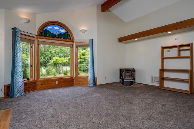 33958 Connolly Way, Polson, MT 59860 - unfurnished living room with a wood stove, carpet, beamed ceiling, high vaulted ceiling, and recessed lighting