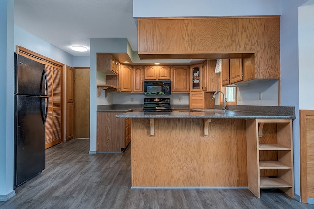 33958 Connolly Way, Polson, MT 59860 - kitchen with black appliances, open shelves, and dark wood-style floors