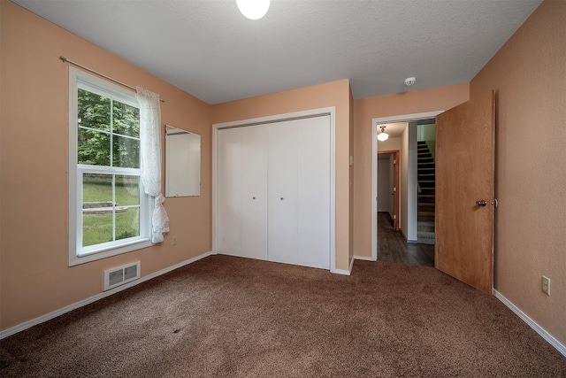 33958 Connolly Way, Polson, MT 59860 - unfurnished bedroom with carpet and a closet