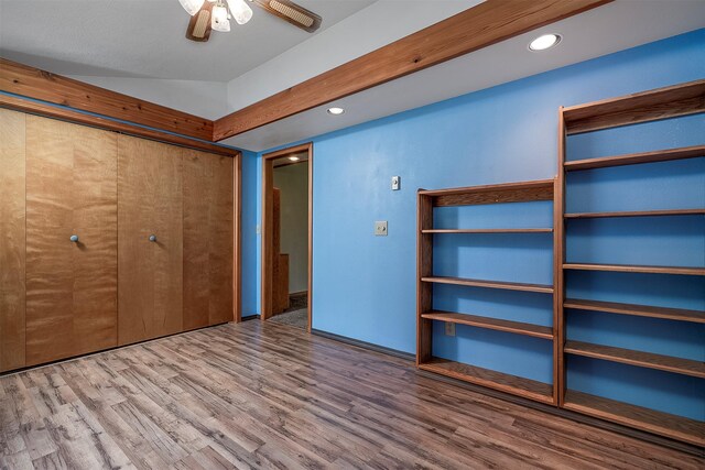 33958 Connolly Way, Polson, MT 59860 - unfurnished bedroom featuring wood finished floors, recessed lighting, and a ceiling fan