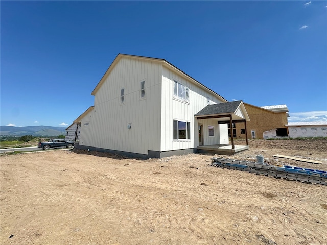 4429 Harrison Scott Dr, Missoula, MT 59803 - rear view of house featuring a mountain view