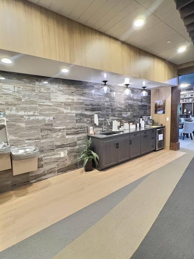 100 Woodlands Way Unit W-204, Kalispell, MT 59901 - bar area with recessed lighting and tile walls