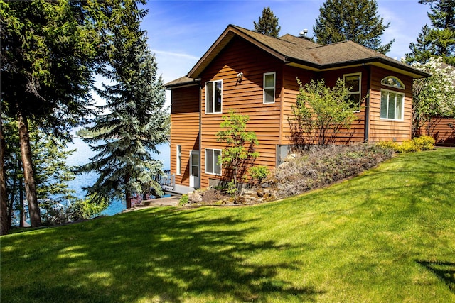 29137 Rocky Point Rd, Polson, MT 59860 - view of side of property featuring a lawn