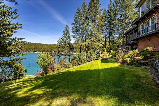 29137 Rocky Point Rd, Polson, MT 59860 - view of grassy yard featuring a water view and a view of trees