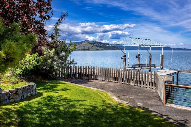 29137 Rocky Point Rd, Polson, MT 59860 - dock featuring boat lift and a water and mountain view