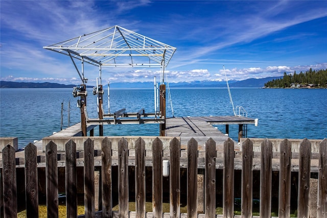 29137 Rocky Point Rd, Polson, MT 59860 - dock featuring boat lift and a water and mountain view