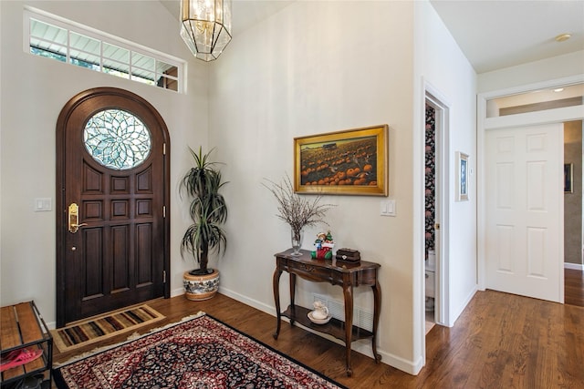 29137 Rocky Point Rd, Polson, MT 59860 - entryway with wood finished floors, baseboards, and a chandelier