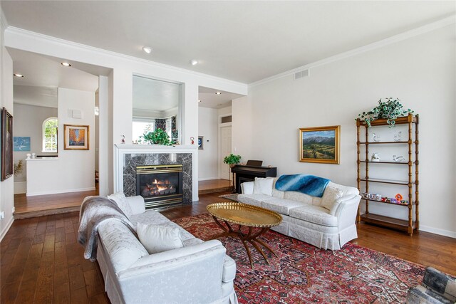 29137 Rocky Point Rd, Polson, MT 59860 - living room with dark wood finished floors, baseboards, a high end fireplace, crown molding, and recessed lighting