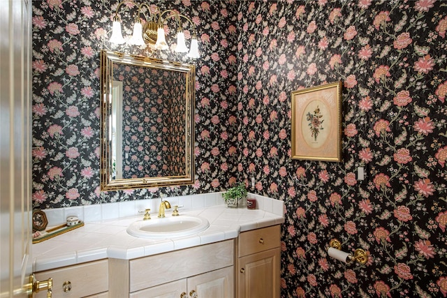 29137 Rocky Point Rd, Polson, MT 59860 - bathroom with wallpapered walls and vanity
