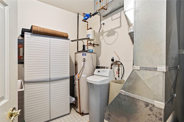 29137 Rocky Point Rd, Polson, MT 59860 - laundry area featuring electric water heater, tile patterned floors, and heating unit