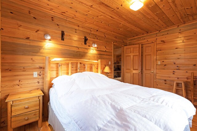 15530 S Sperry Grade Rd, Greenough, MT 59823 - bedroom with wooden walls and wooden ceiling