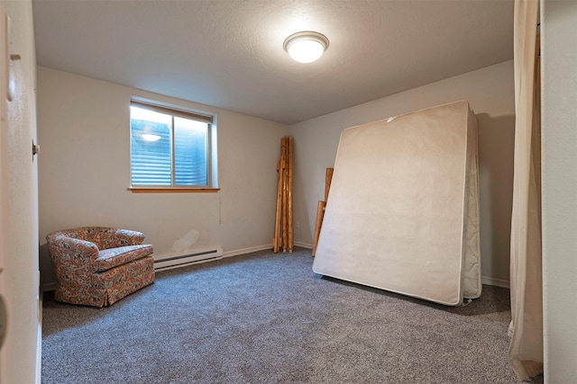 15530 S Sperry Grade Rd, Greenough, MT 59823 - unfurnished room with a baseboard heating unit and carpet flooring
