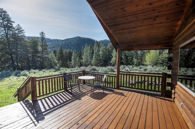 15530 S Sperry Grade Rd, Greenough, MT 59823 - wooden deck featuring a forest view and a mountain view