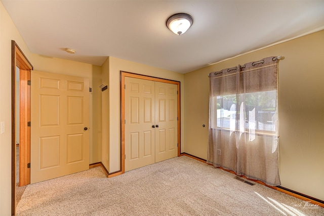 2724 Overlook Blvd, Helena, MT 59601 - unfurnished bedroom with a closet, carpet flooring, and baseboards