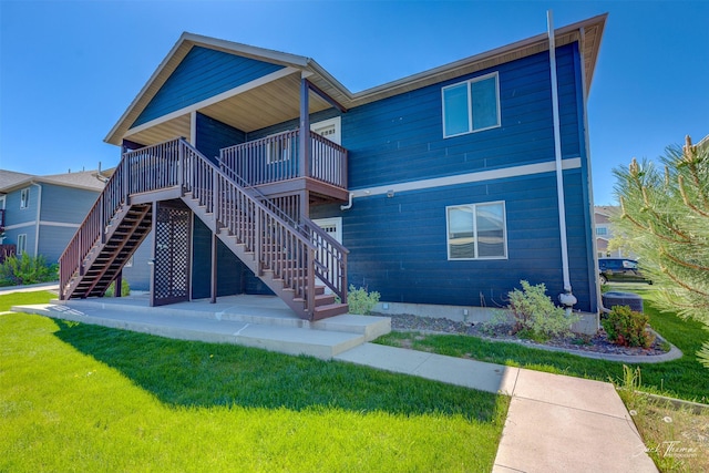 2724 Overlook Blvd, Helena, MT 59601 - back of property featuring stairway and a lawn