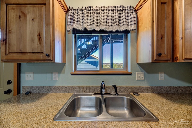 2724 Overlook Blvd, Helena, MT 59601 - kitchen with a sink and brown cabinets