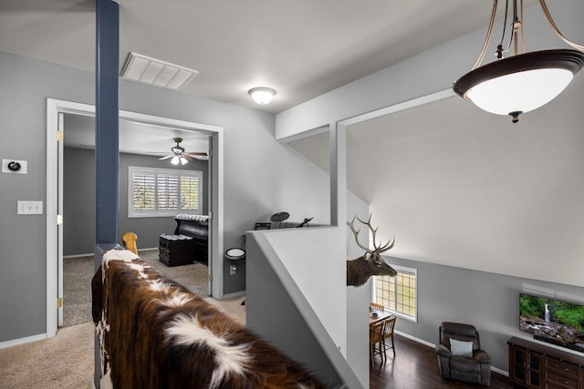 25 Logan Way, Kalispell, MT 59901 - carpeted living area featuring plenty of natural light and a ceiling fan