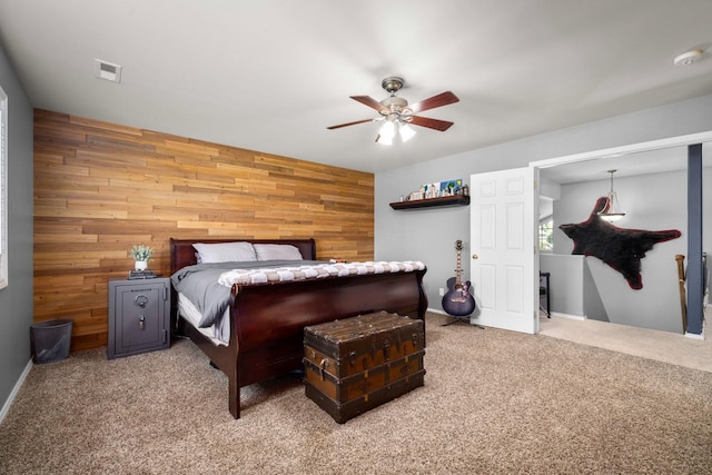 25 Logan Way, Kalispell, MT 59901 - bedroom with wooden walls, carpet floors, and ceiling fan