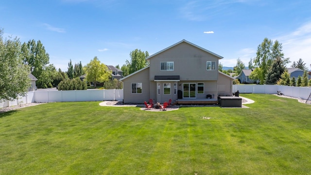 25 Logan Way, Kalispell, MT 59901 - back of property with a fenced backyard and a wooden deck