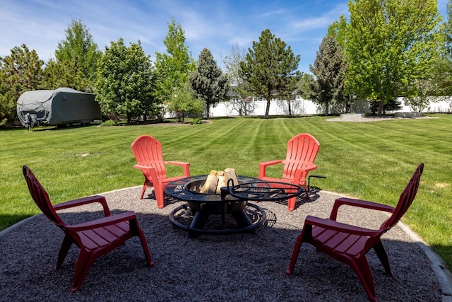 25 Logan Way, Kalispell, MT 59901 - view of yard with an outdoor fire pit