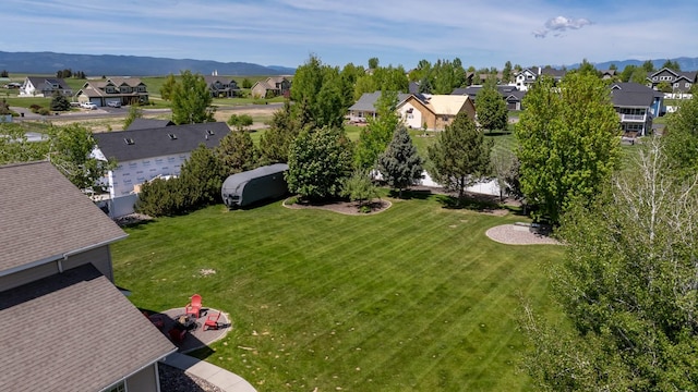 25 Logan Way, Kalispell, MT 59901 - view of green lawn with a residential view and a mountain view