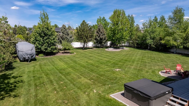 25 Logan Way, Kalispell, MT 59901 - fenced backyard with a hot tub