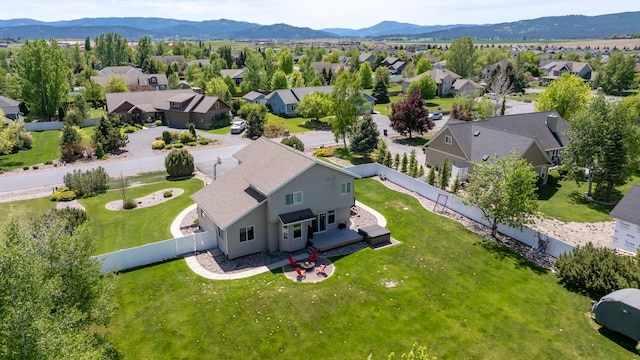 25 Logan Way, Kalispell, MT 59901 - aerial view of residential area featuring a mountainous background